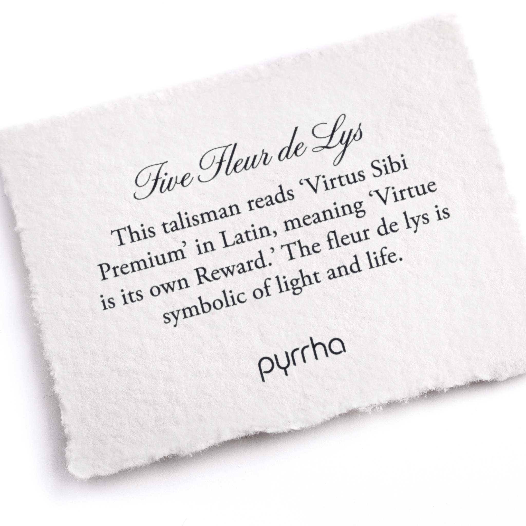 A hand-torn, letterpress printed card describing the meaning for Pyrrha's Five Fleur de Lys Talisman