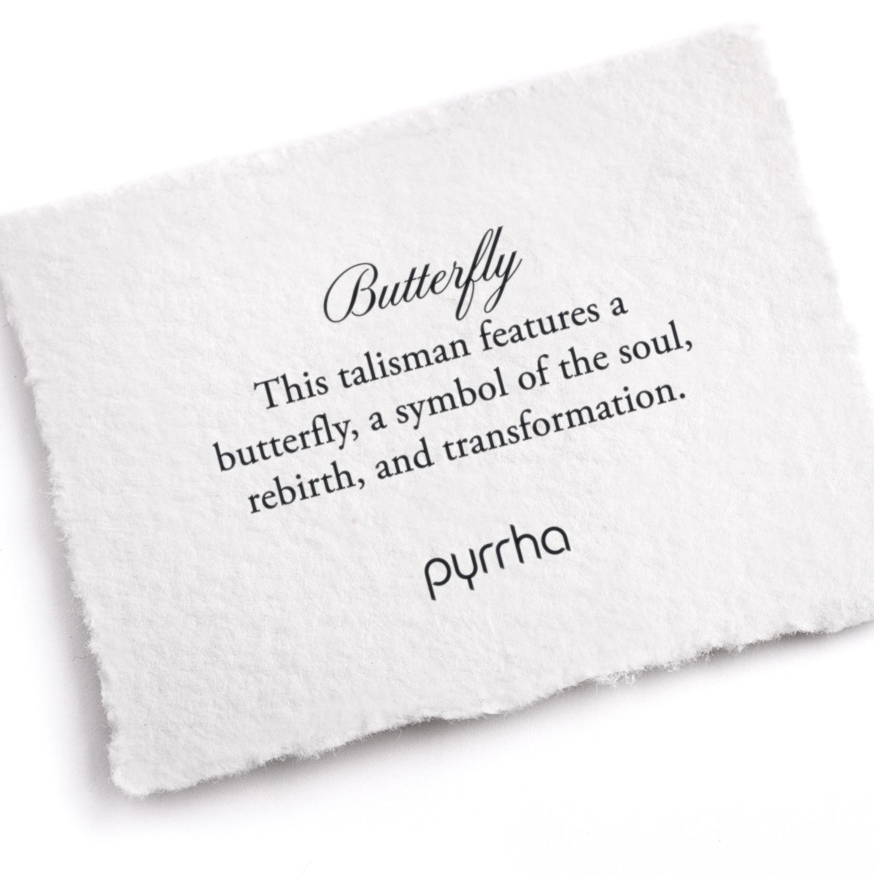 A hand-torn, letterpress printed card describing the meaning for Pyrrha's Butterfly Talisman