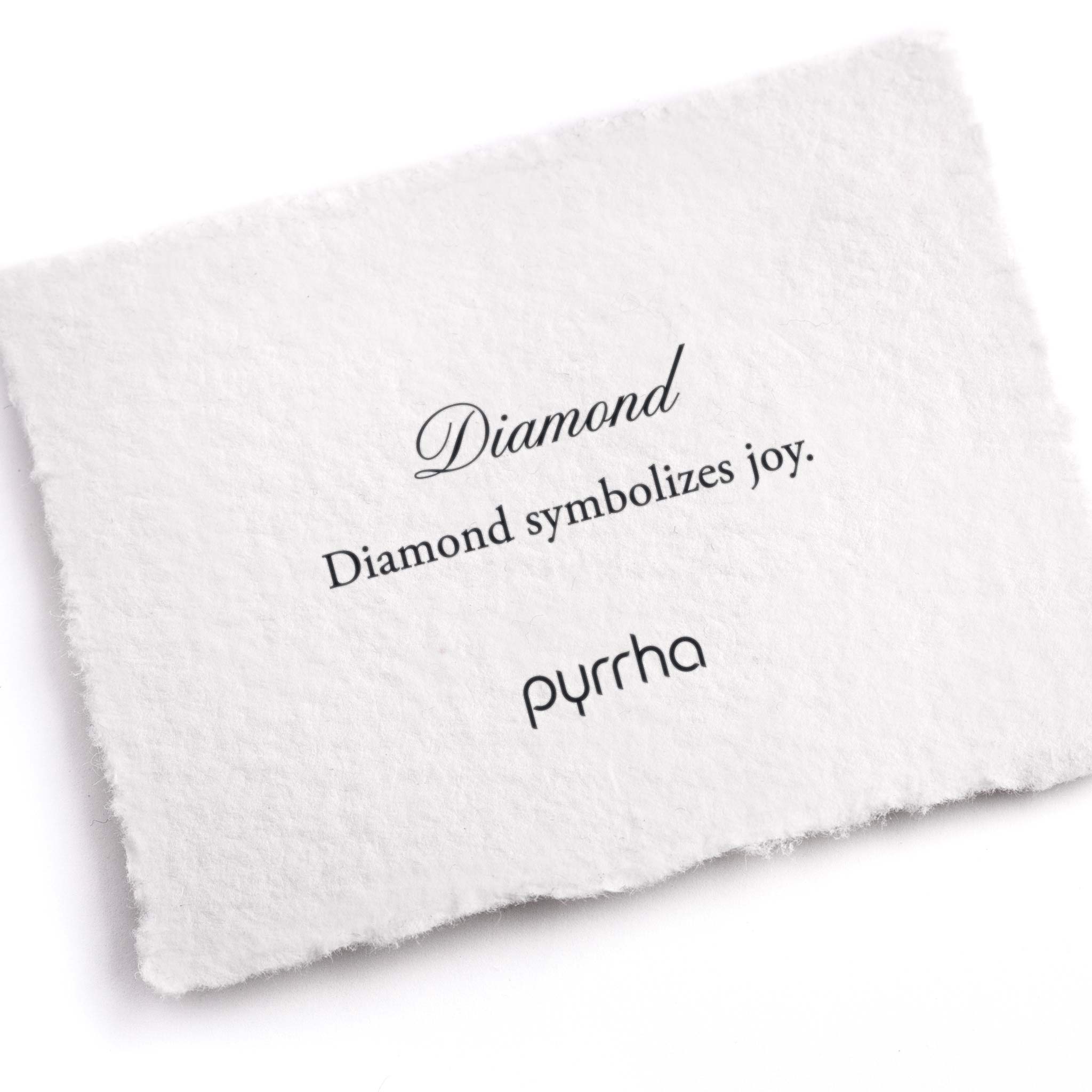 A hand-torn, letterpress printed card describing the meaning for Pyrrha's Diamond