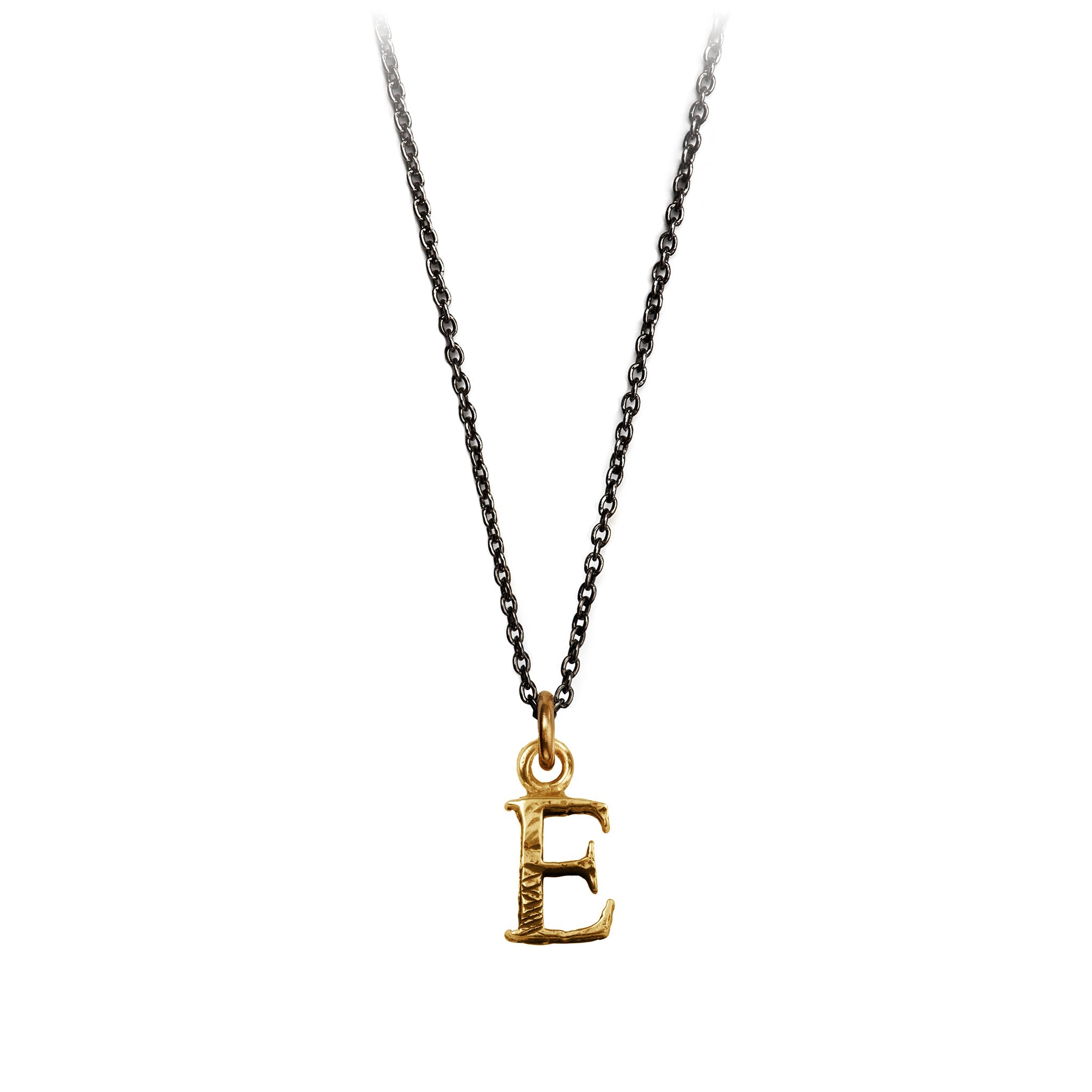 A bronze "E" charm on a blackened sterling silver chain