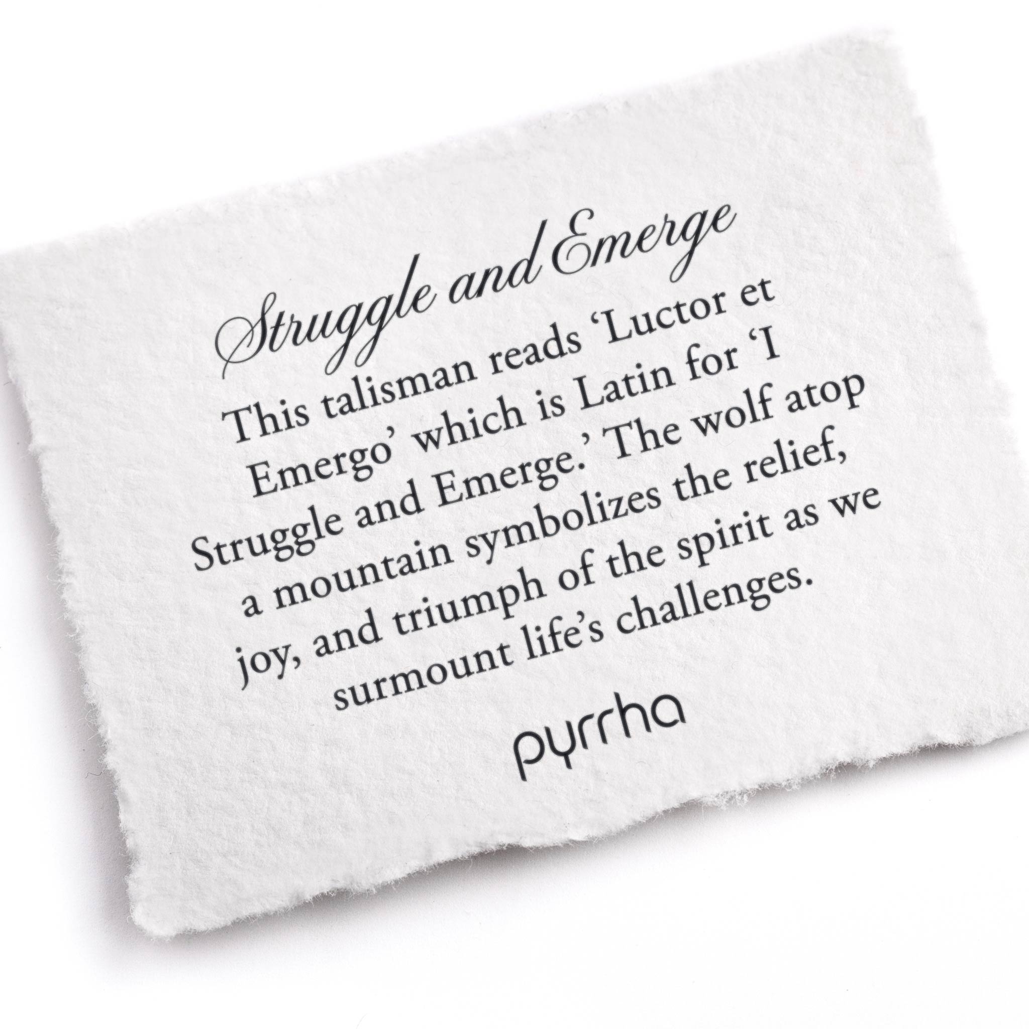 A hand-torn, letterpress printed card describing the meaning for Pyrrha's Struggle and Emerge Talisman