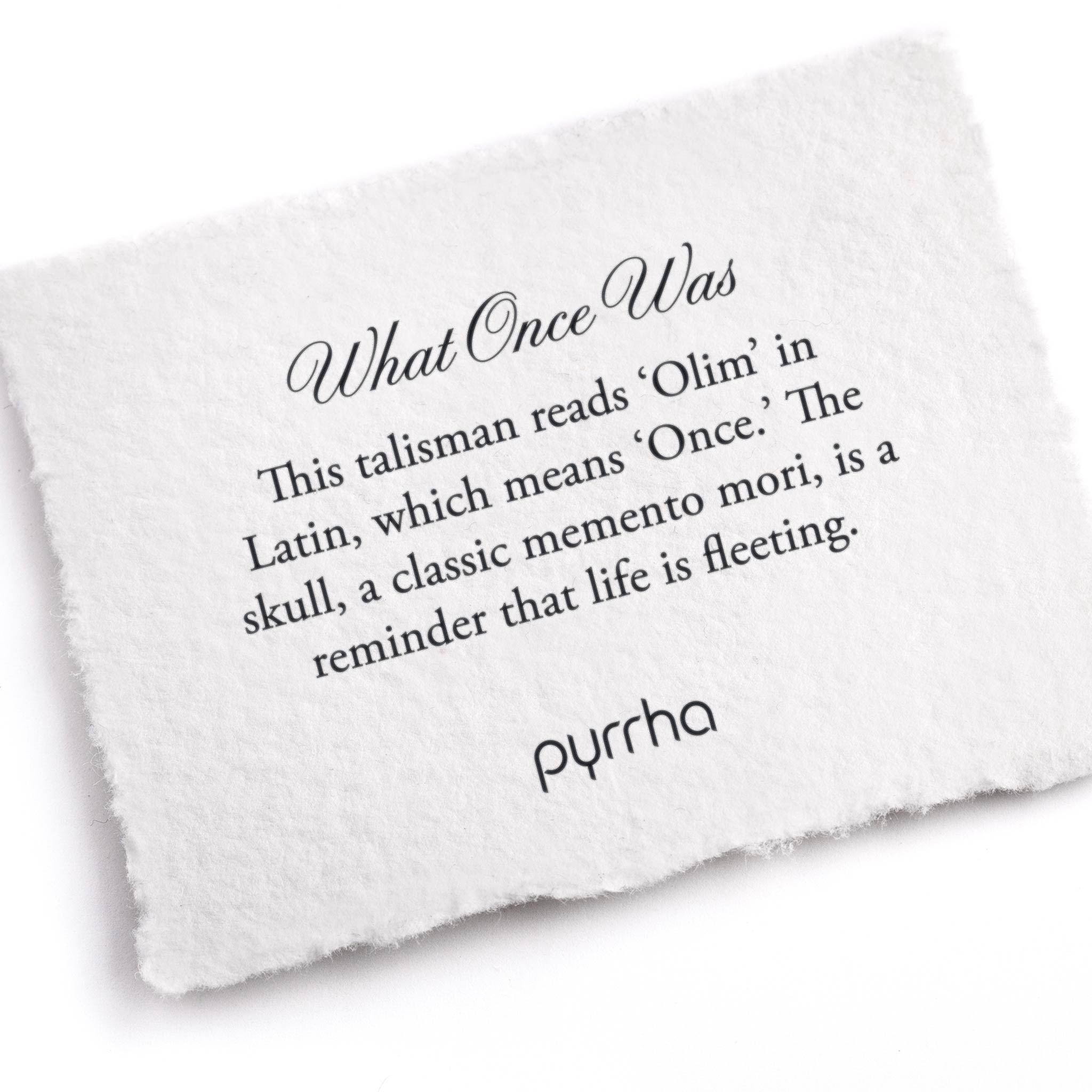 A hand-torn, letterpress printed card describing the meaning for Pyrrha's What Once Was Talisman