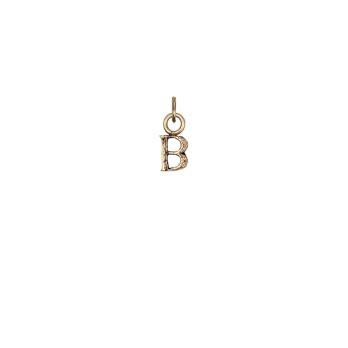 A 14k gold charm in the shape of the letter "B".