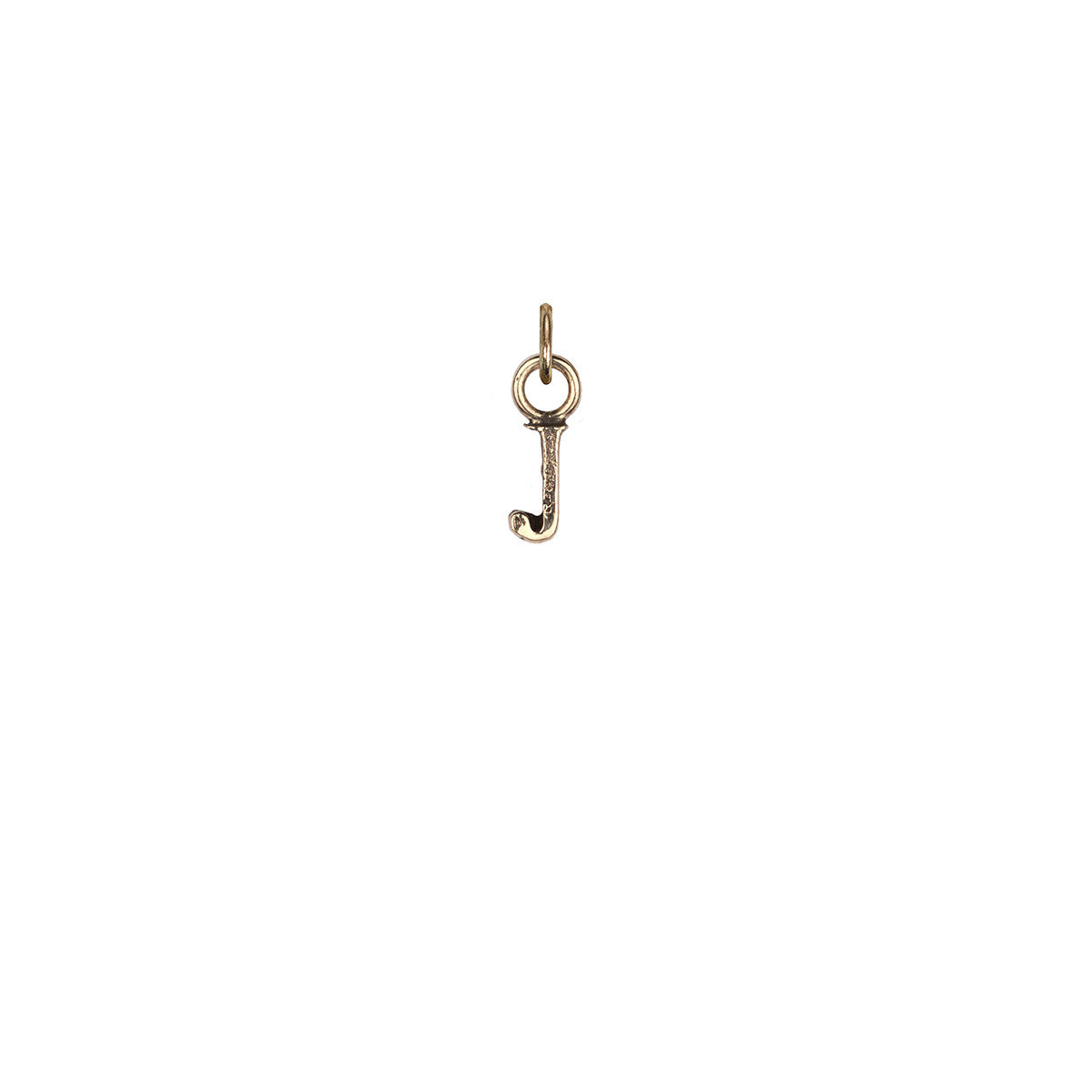 A 14k gold charm in the shape of the letter "J".