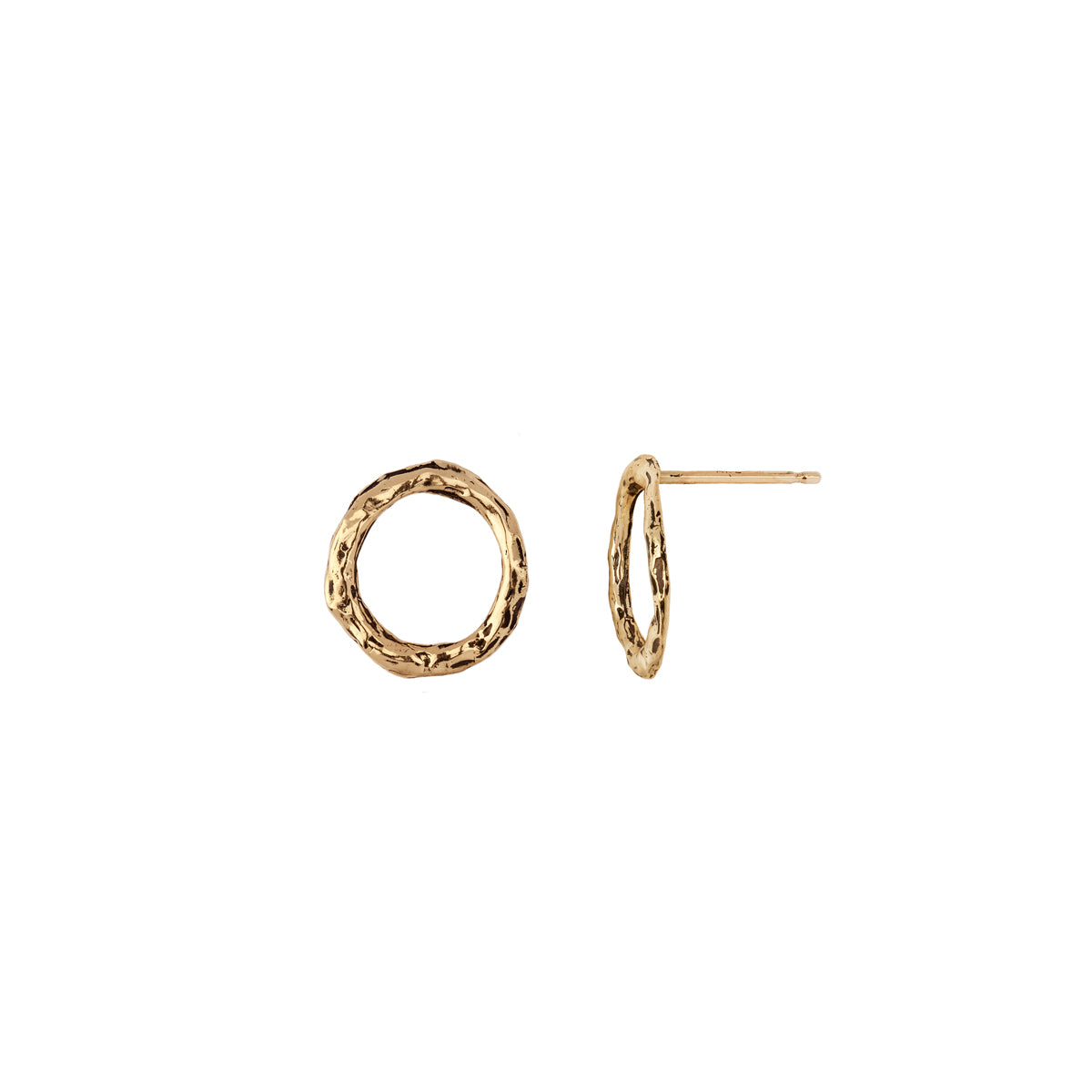 A set of extra small 14k gold stud earrings with an open circle design.
