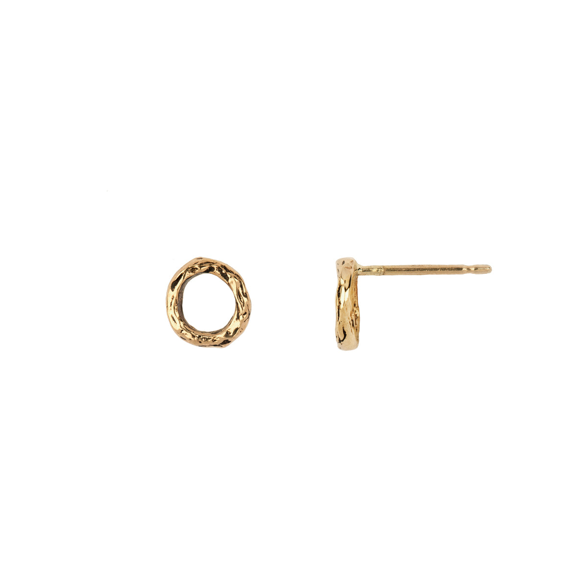 A set of tiny 14k gold stud earrings with an open circle design.