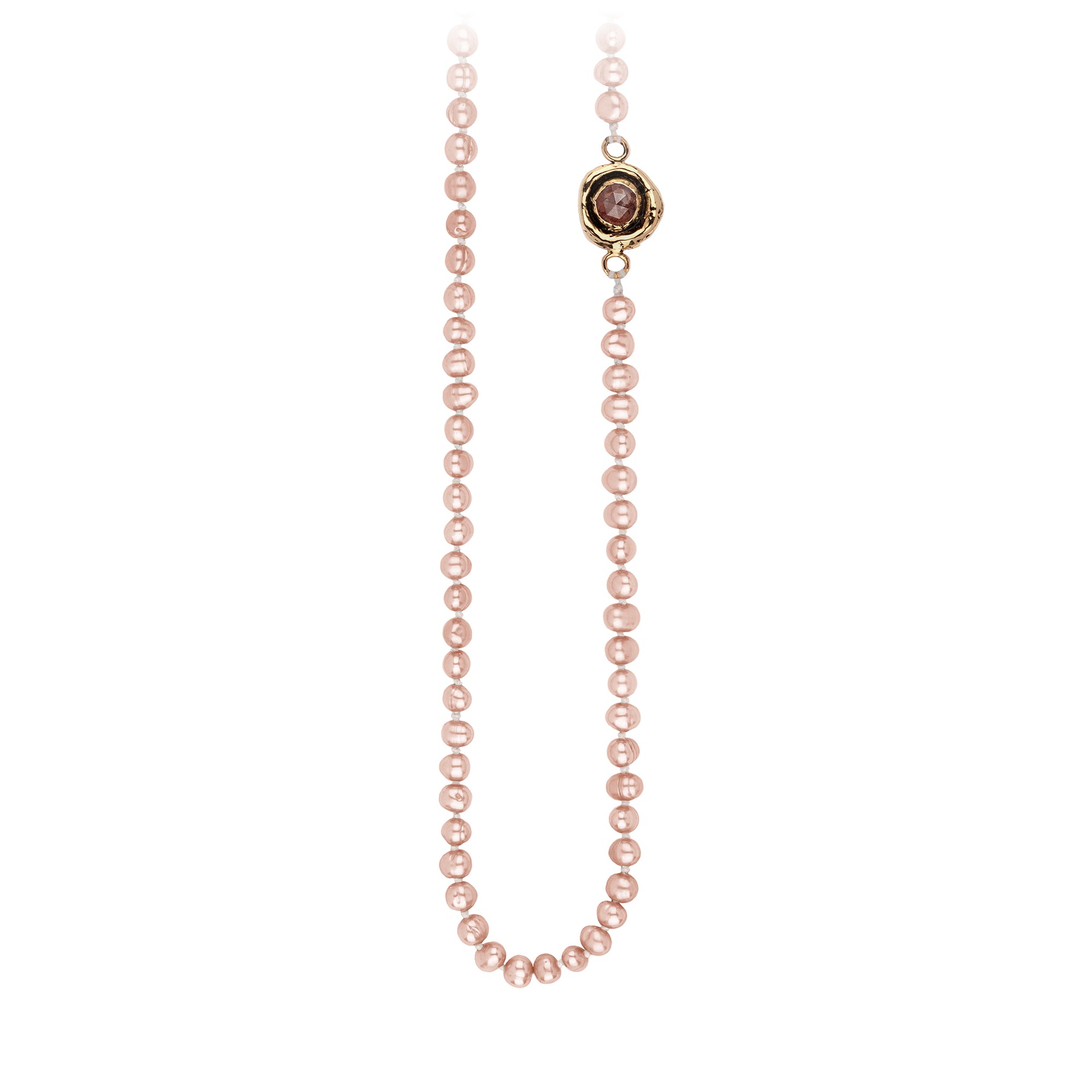 A necklace of hand strung rose pearls with a 14k gold bezel set cognac diamond.