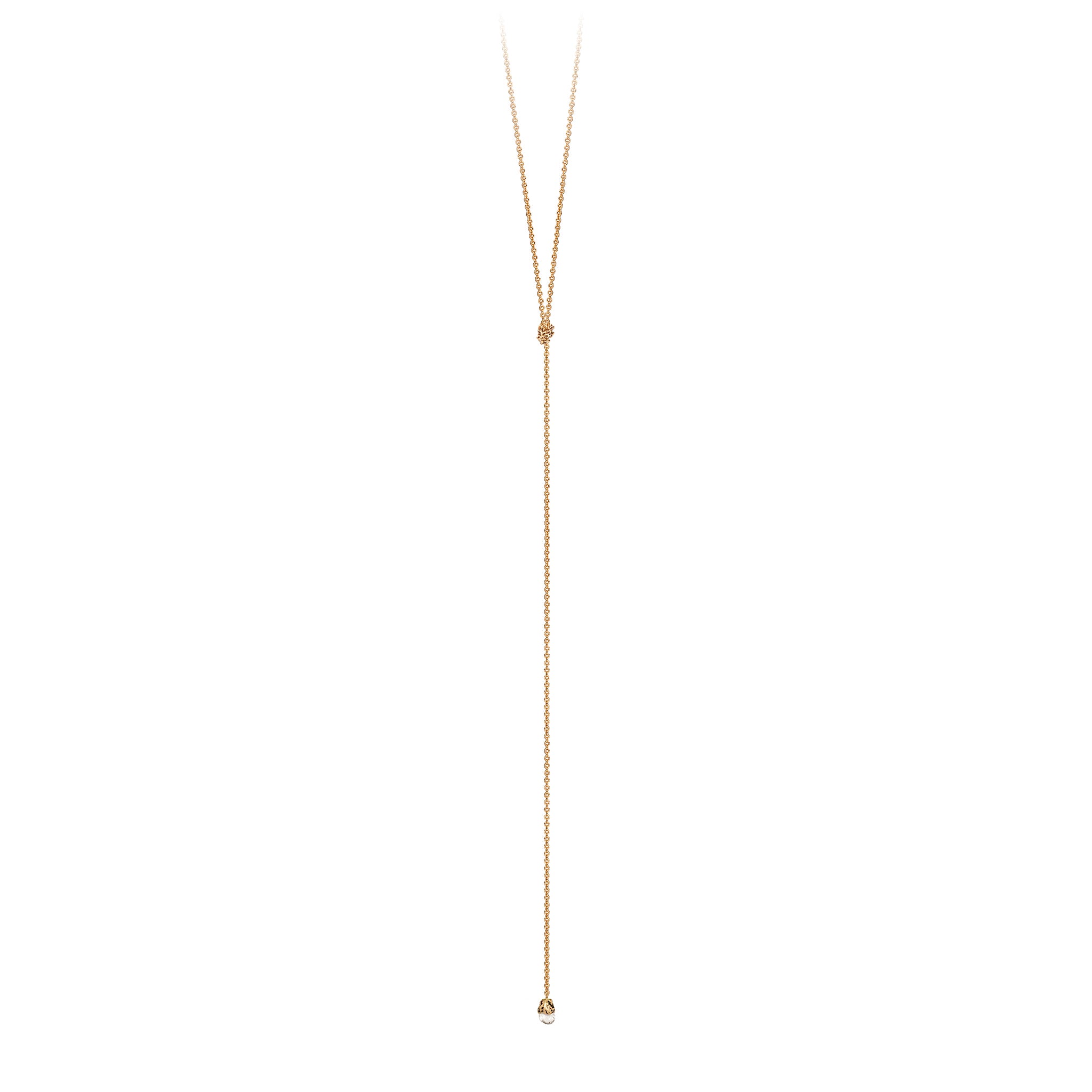 A 14k gold lariat necklace with a bezel set tiny diamond.