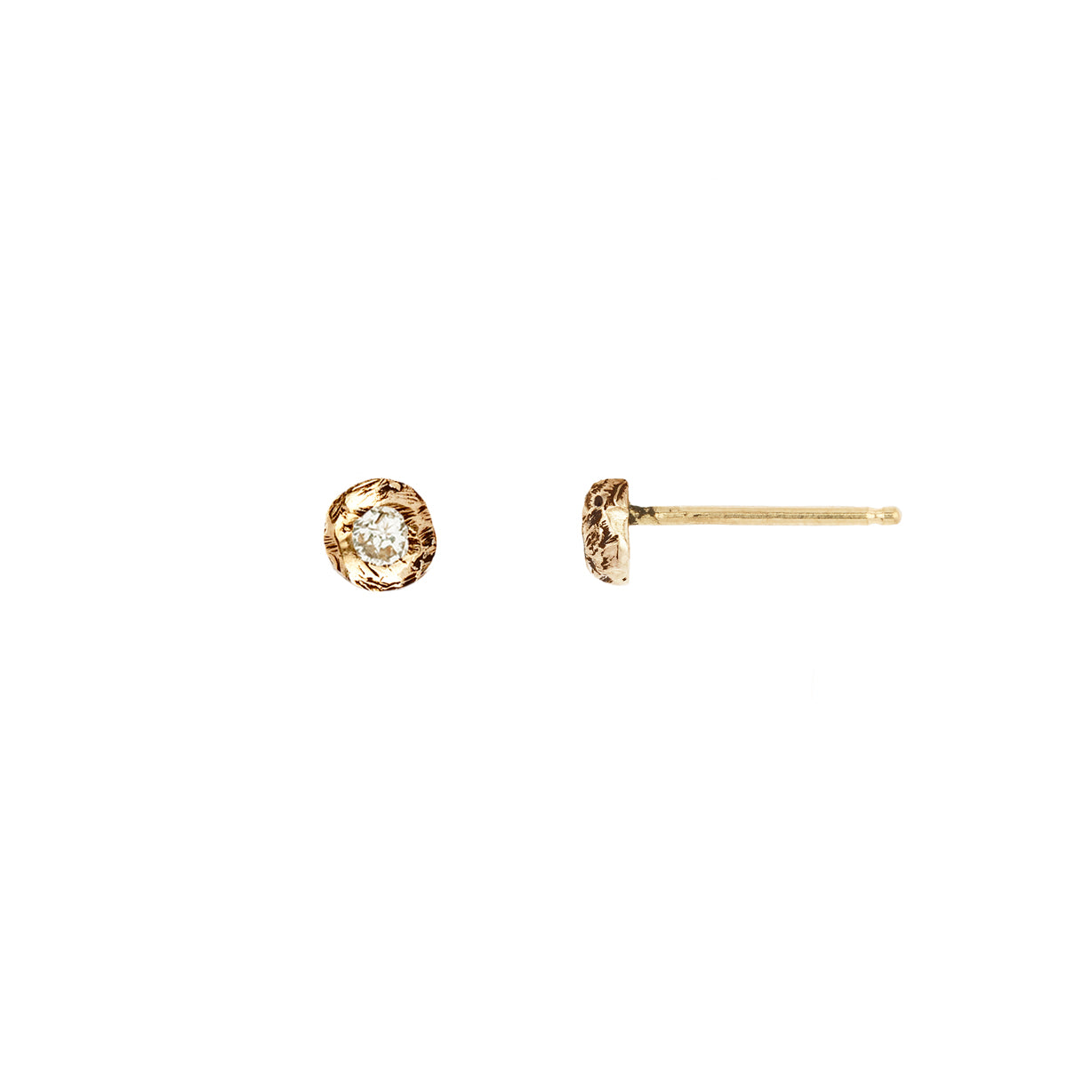 A set of 14k gold stud earrings set with a large white diamond.