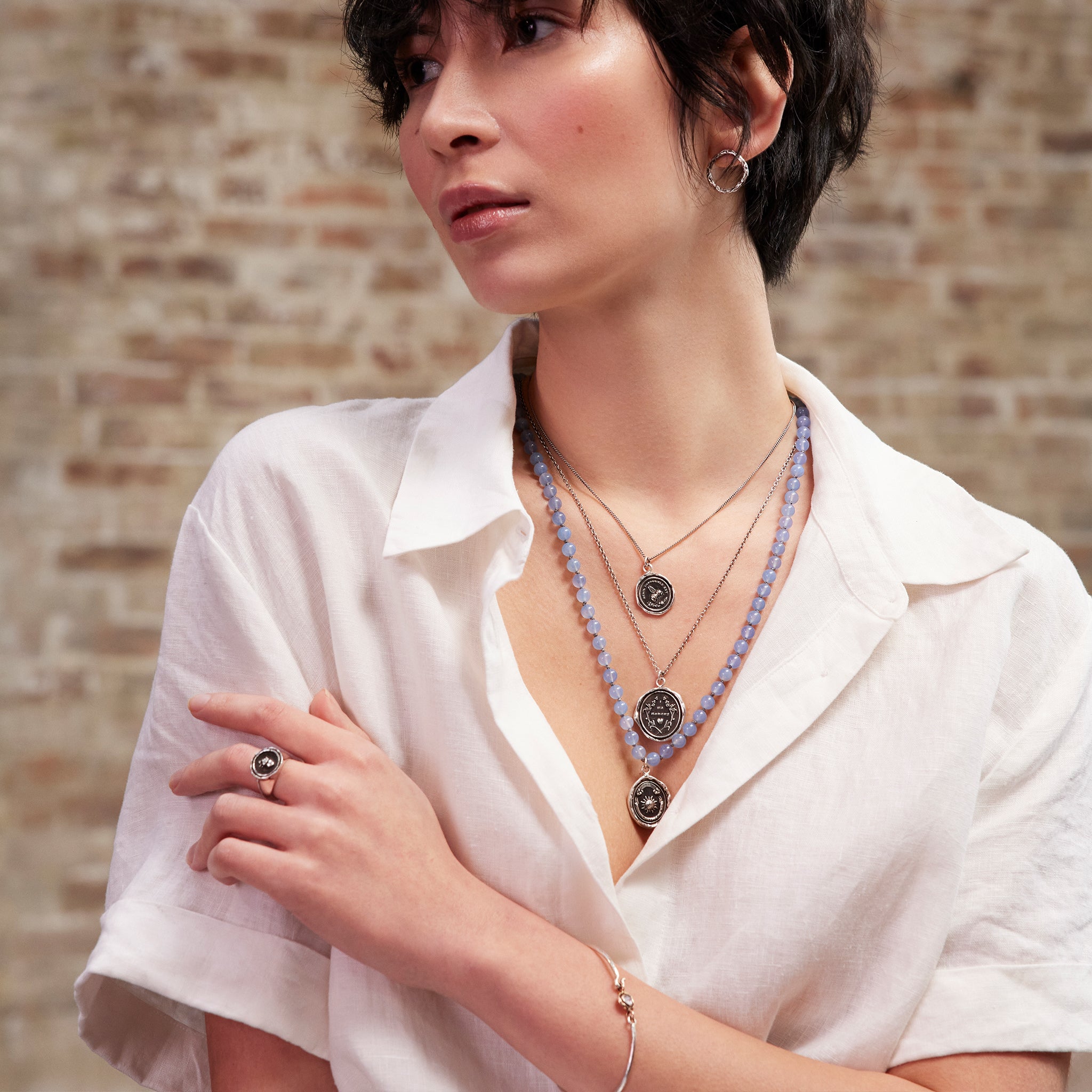 A model wearing our Flaming Heart Signet Ring.