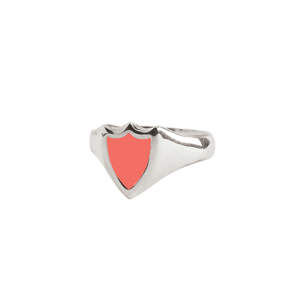 A silver signet ring with our sterling silver and living coral Peace Shield talisman.