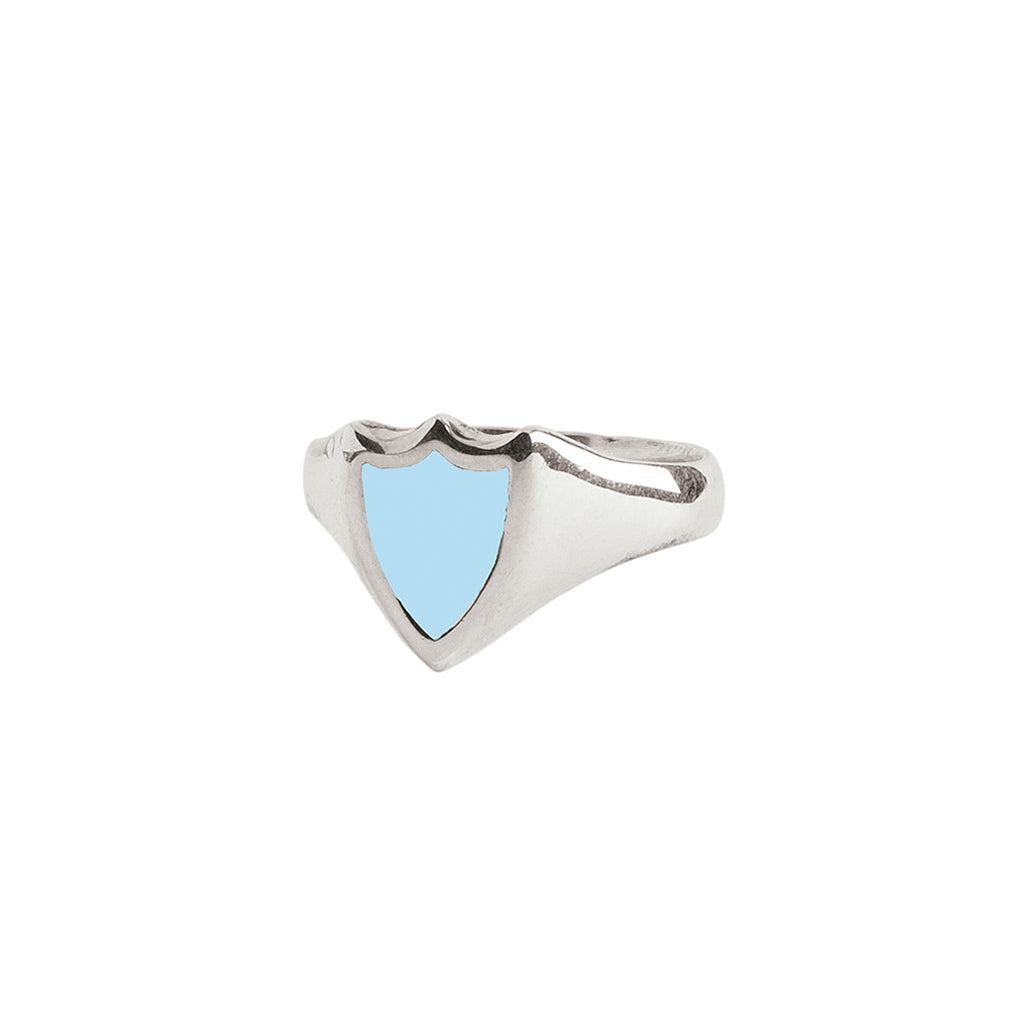 A silver signet ring with our sterling silver and pale blue Peace Shield talisman.
