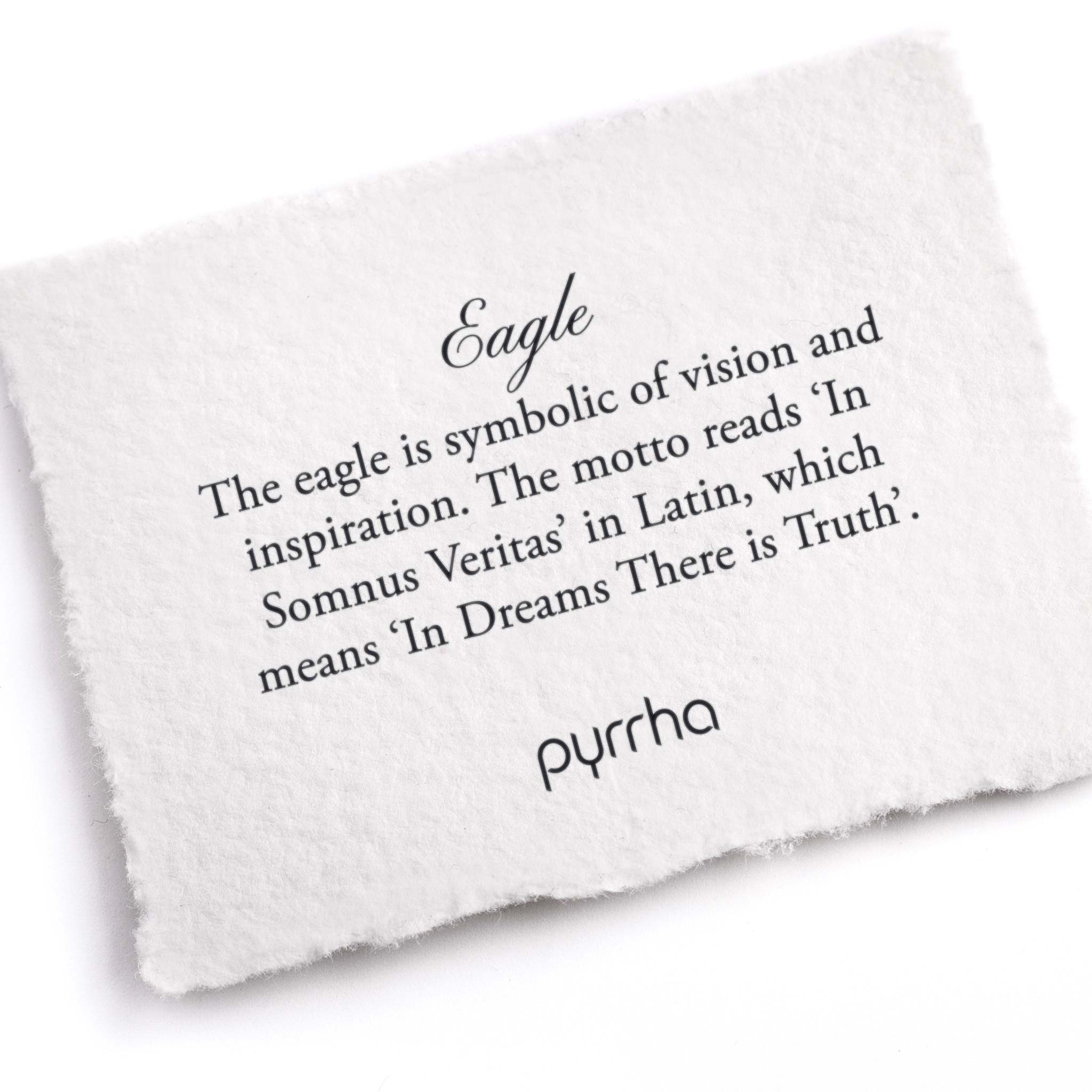 A hand-torn, letterpress printed card describing the meaning for Pyrrha's Eagle Honor Badge