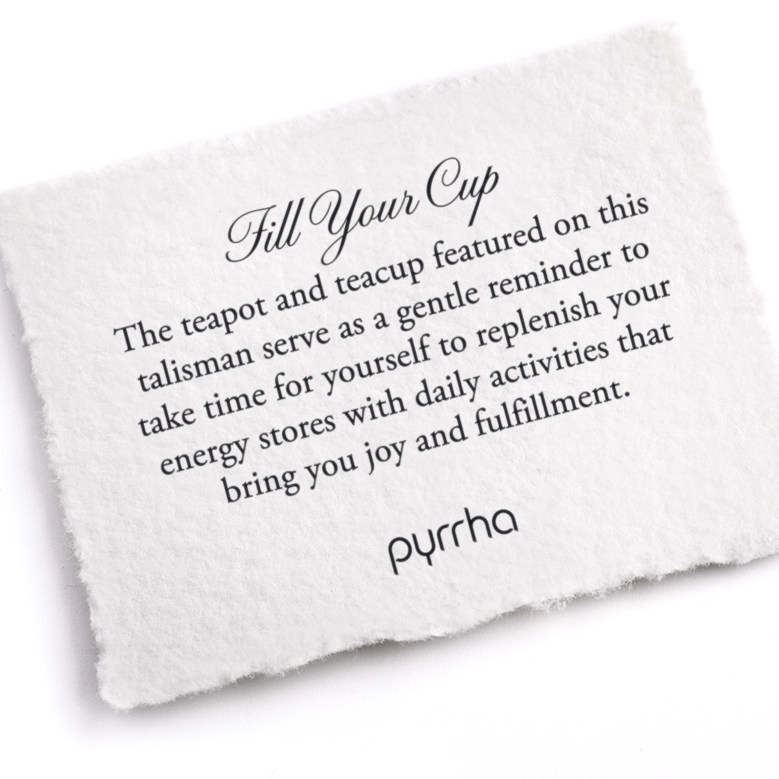 A hand-torn, letterpress printed card describing the meaning for Pyrrha's Fill Your Cup Talisman