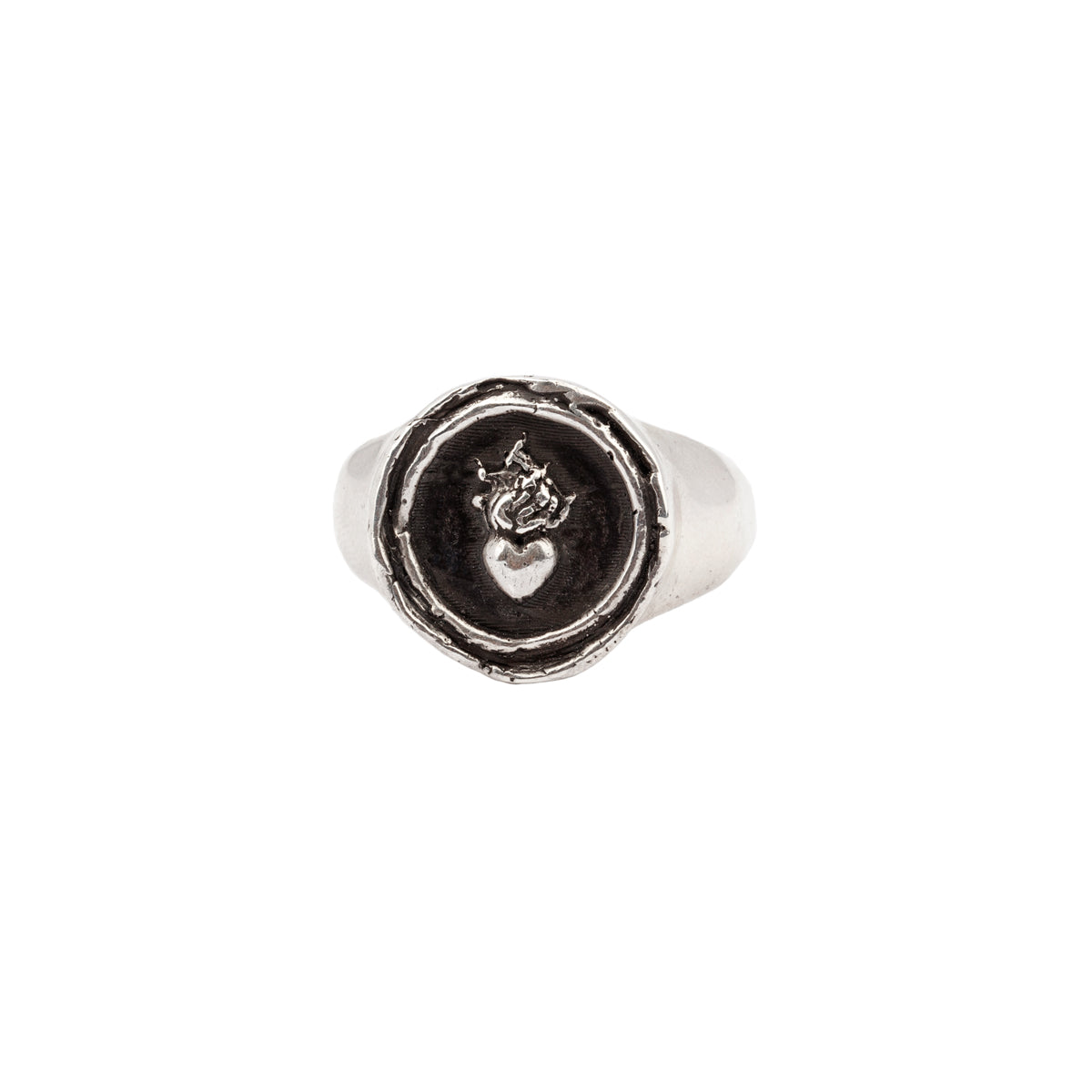 A sterling silver signet ring with our silver Flaming Heart talisman.