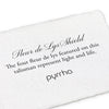 A handtorn cotton card describing the meaning for our Fleur de Lys Shield Tie Bar.