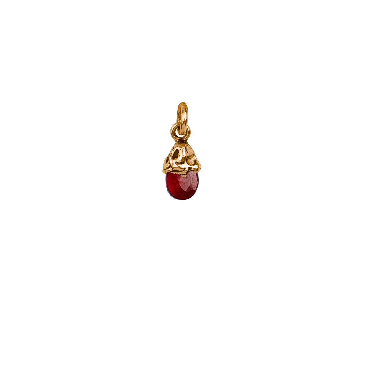 A bronze attraction charm capped with a garnet.