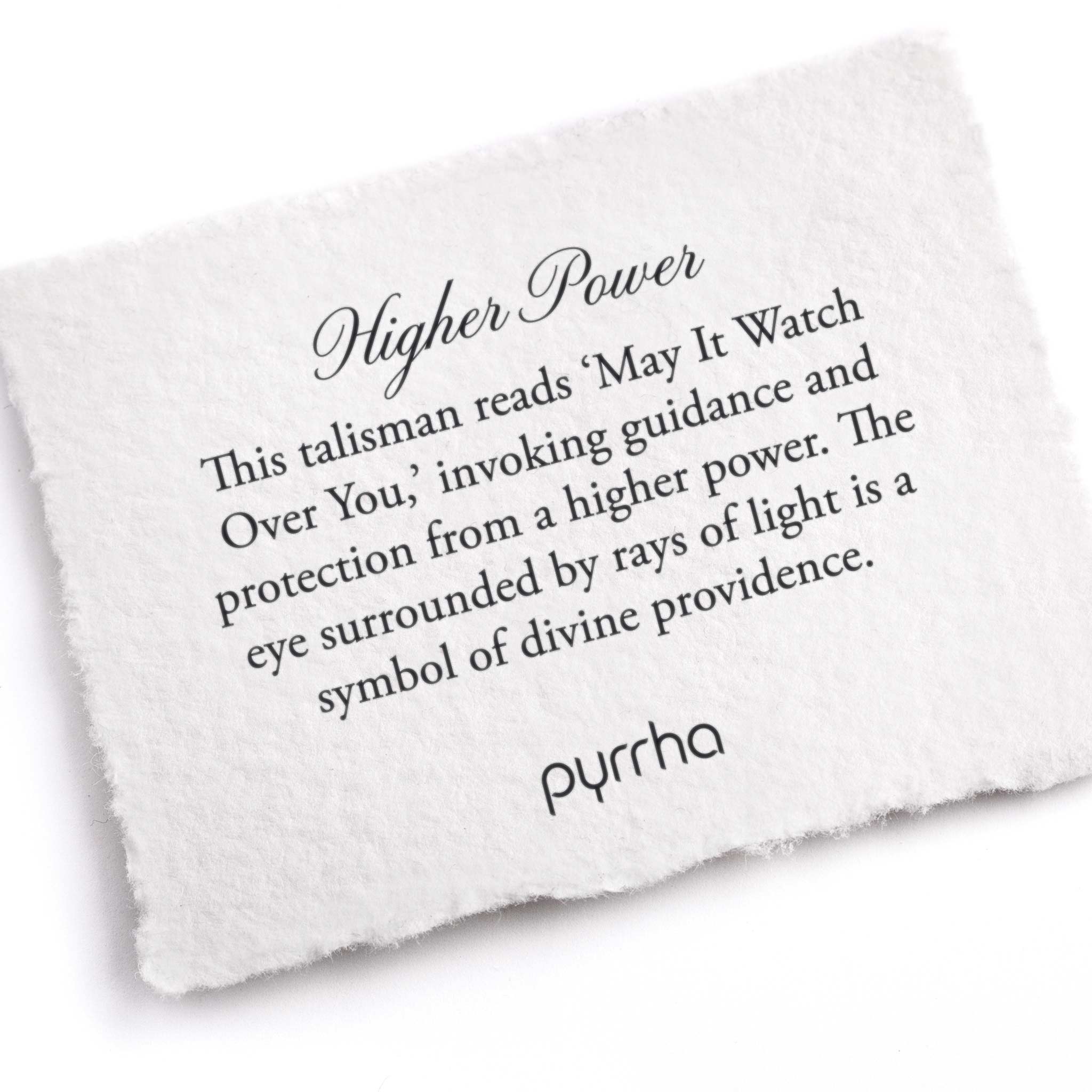 A hand-torn, letterpress printed card describing the meaning for Pyrrha's Higher Power Talisman