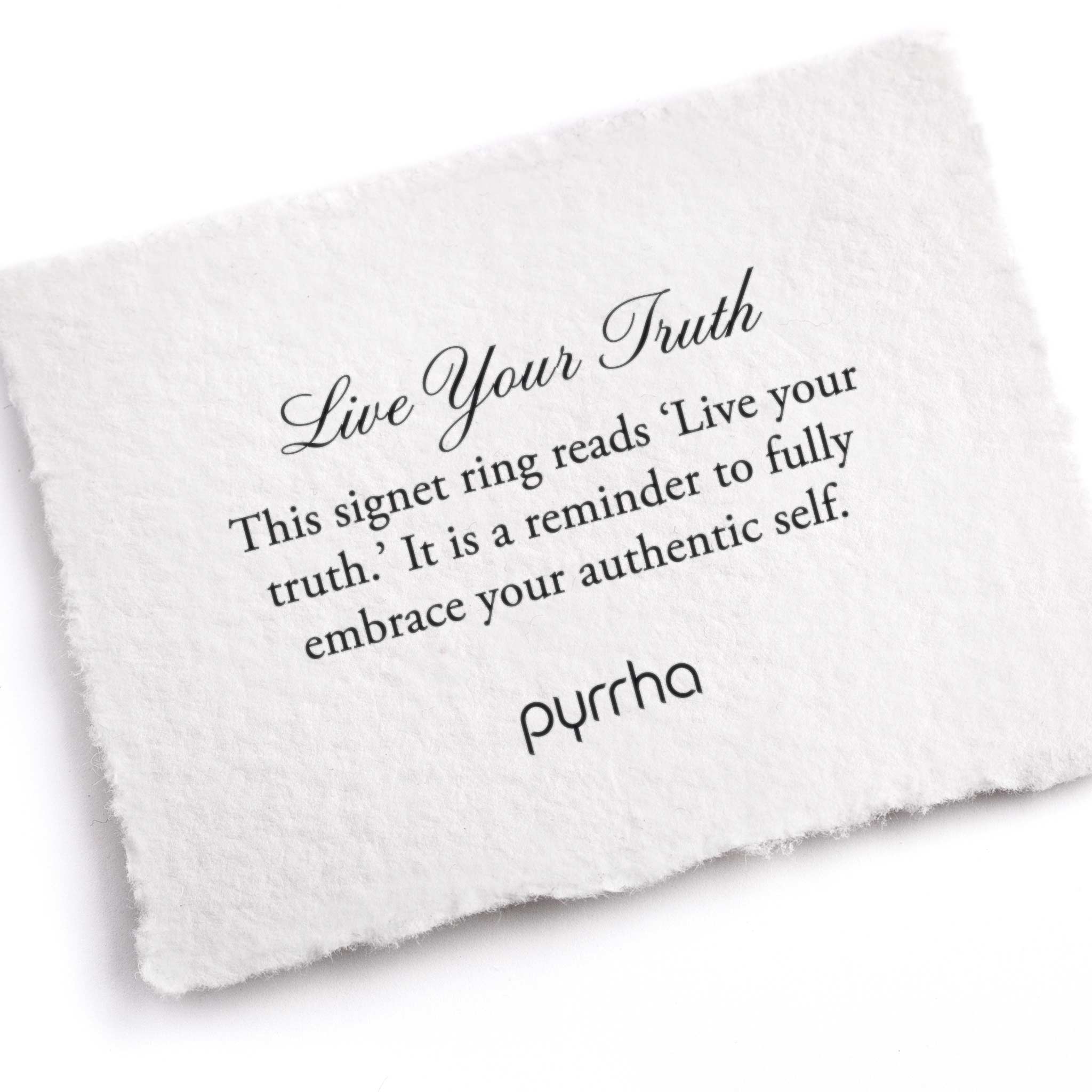 A hand-torn, letterpress printed card describing the meaning for Pyrrha's Live Your Truth Signet Ring