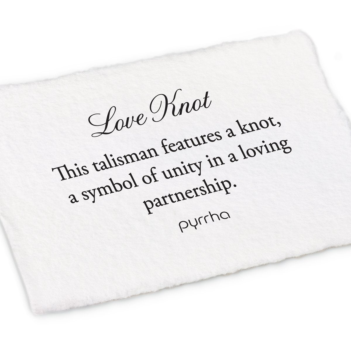 A hand-torn, letterpress printed card describing the meaning for Pyrrha's Love Knot Talisman Charm