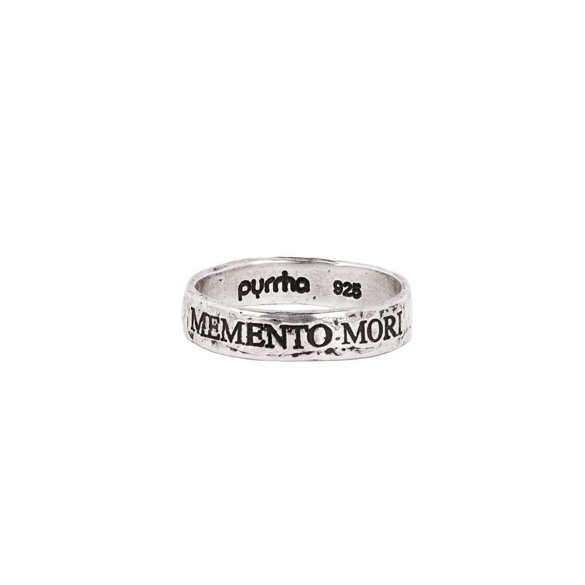 A silver band ring with the phrase Memento Mori engraved into it