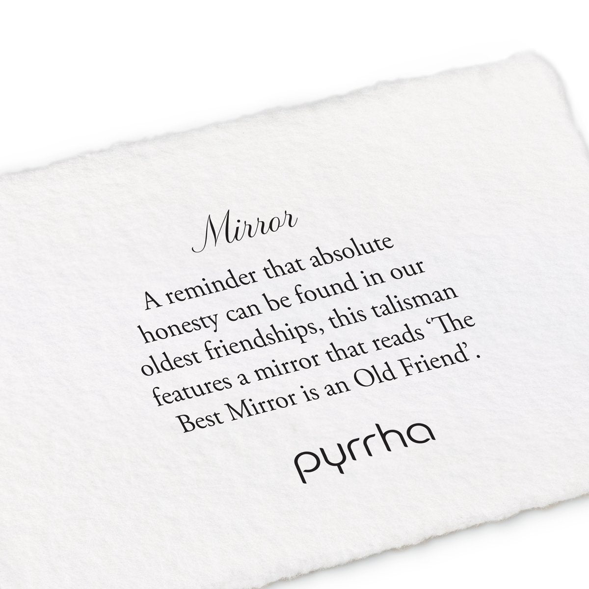 A hand-torn, letterpress printed card describing the meaning for Pyrrha's Mirror Talisman