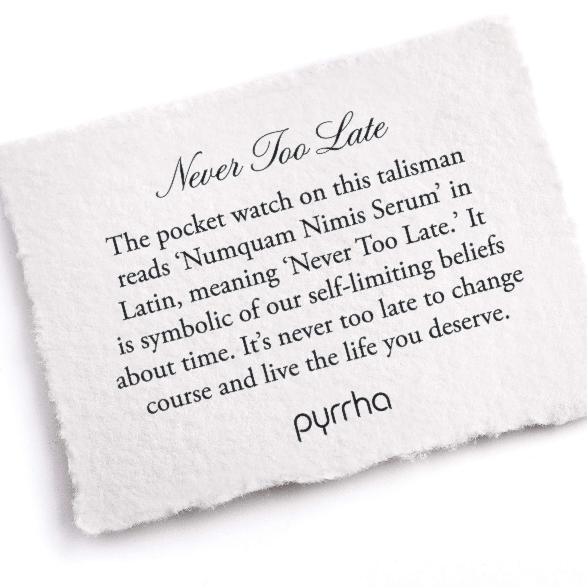 A hand-torn, letterpress printed card describing the meaning for Pyrrha's Never Too Late Talisman