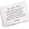 A hand-torn, letterpress printed card describing the meaning for Pyrrha's Open Your Mind 14K Gold Talisman