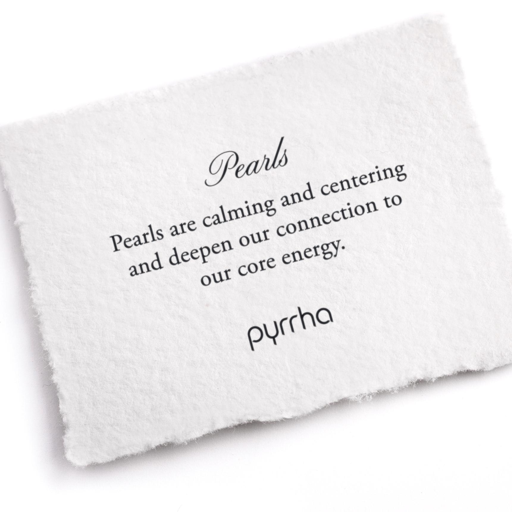 A hand-torn, letterpress printed card describing the meaning for Pyrrha's Pearl