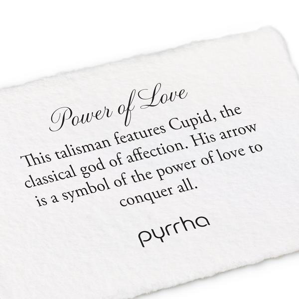 A hand-torn, letterpress printed card describing the meaning for Pyrrha's Power of Love Talisman
