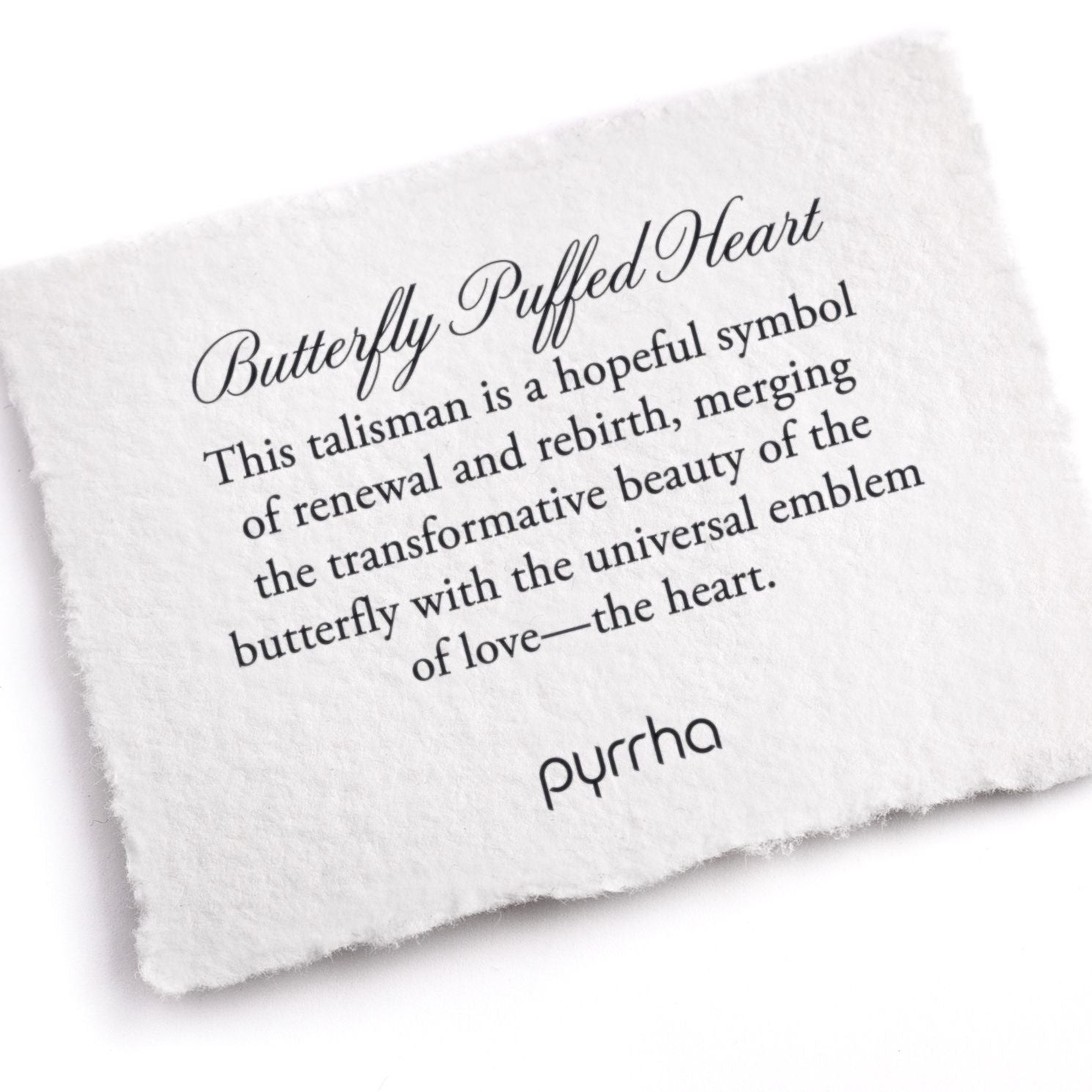 A hand-torn, letterpress printed card describing the meaning for Pyrrha's Butterfly Puffed Heart Talisman