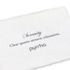 A handtorn cotton card describing the meaning for our serenity capped open bangle