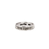 A silver band ring with the phrase Sine Timore engraved into it