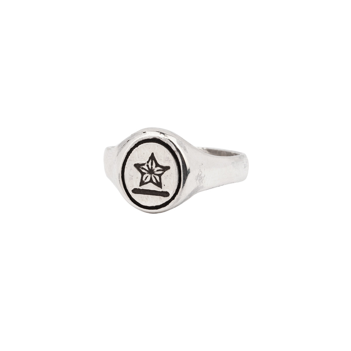 A silver signet ring with our sterling silver Star Oval talisman.