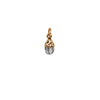 A bronze attraction charm capped with a tourmalated quartz stone.