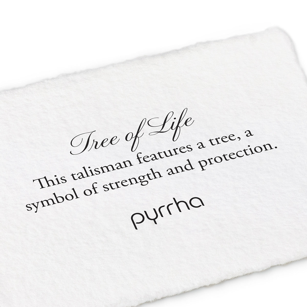 A hand-torn, letterpress printed card describing the meaning for Pyrrha's Tree of Life charm