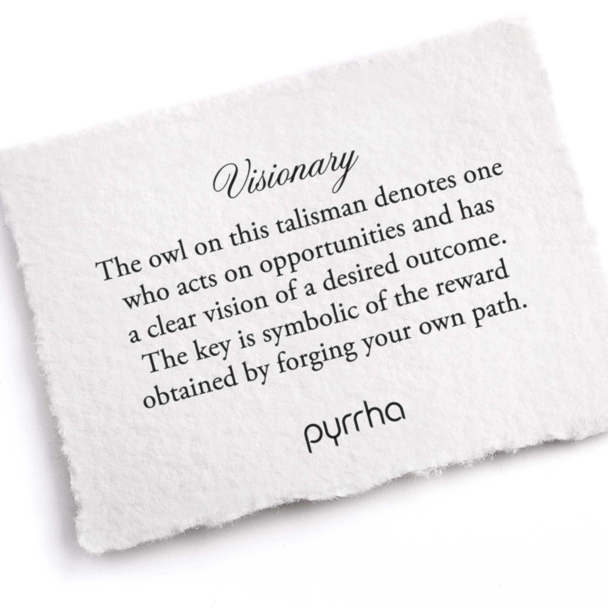 A hand-torn, letterpress printed card describing the meaning for Pyrrha's Visionary Talisman