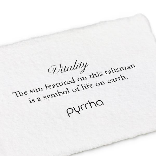A hand-torn, letterpress printed card describing the meaning for Pyrrha's Vitality Talisman