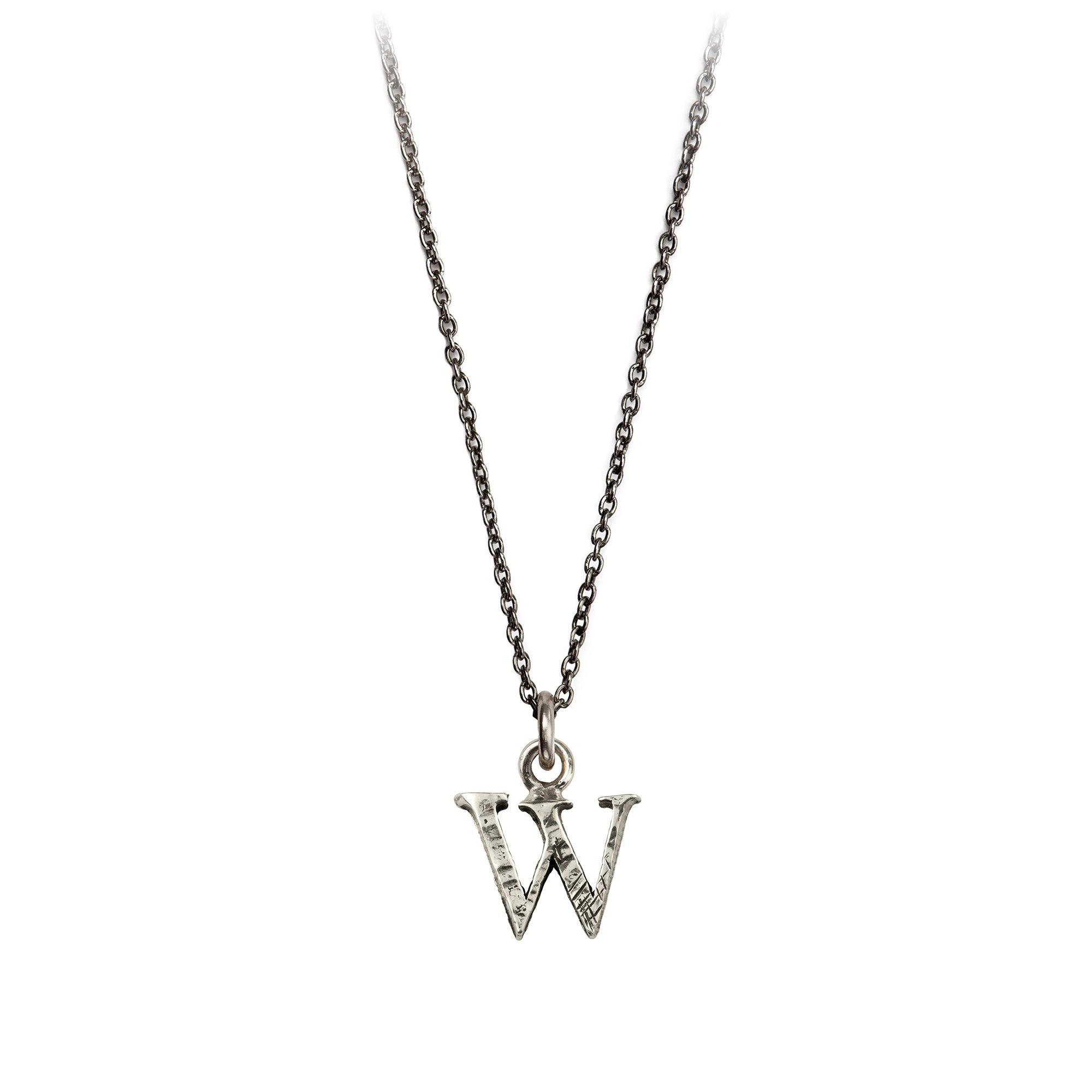 A sterling silver letter "W" charm on a silver chain.