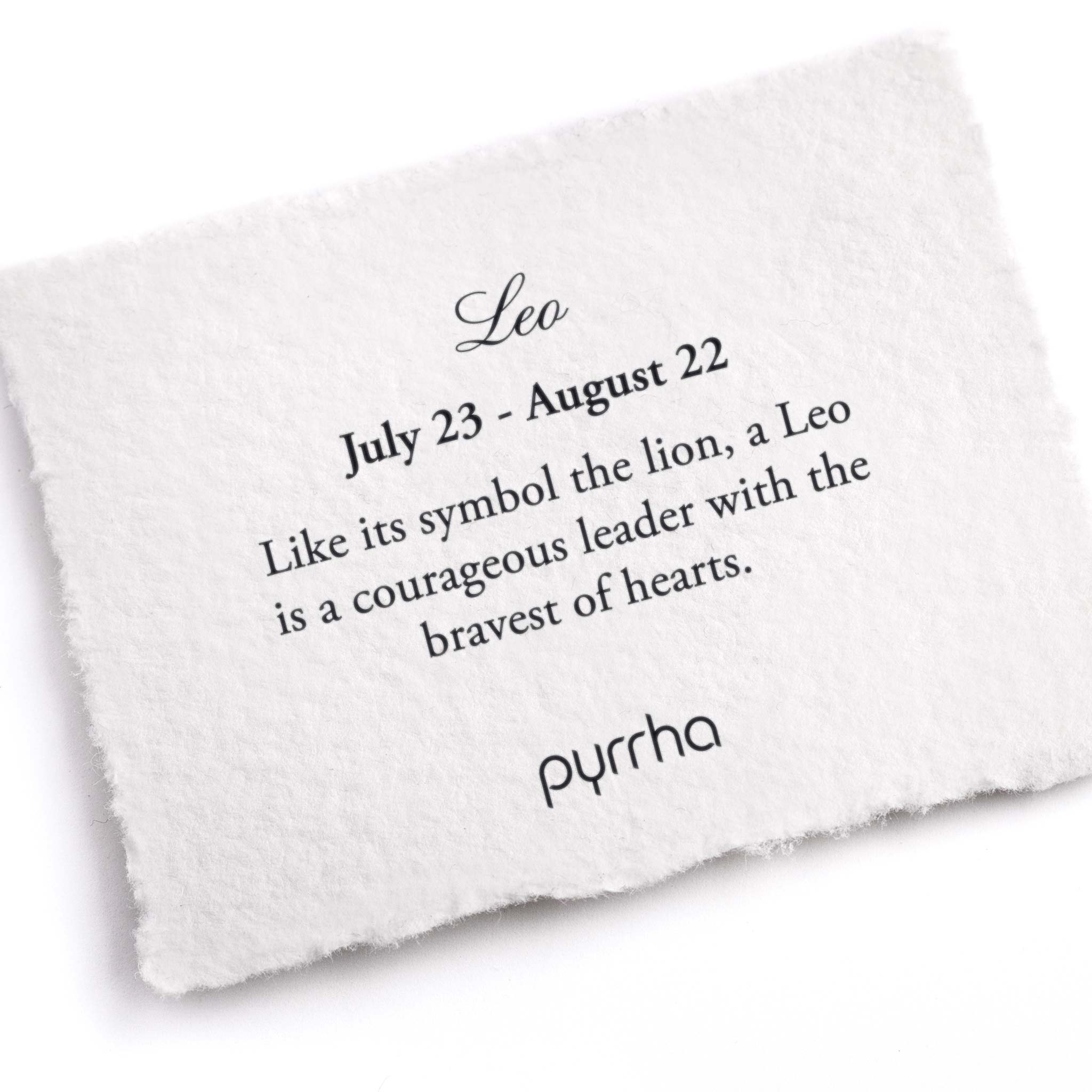 A hand-torn, letterpress printed card describing the meaning for Pyrrha's Leo Zodiac Talisman