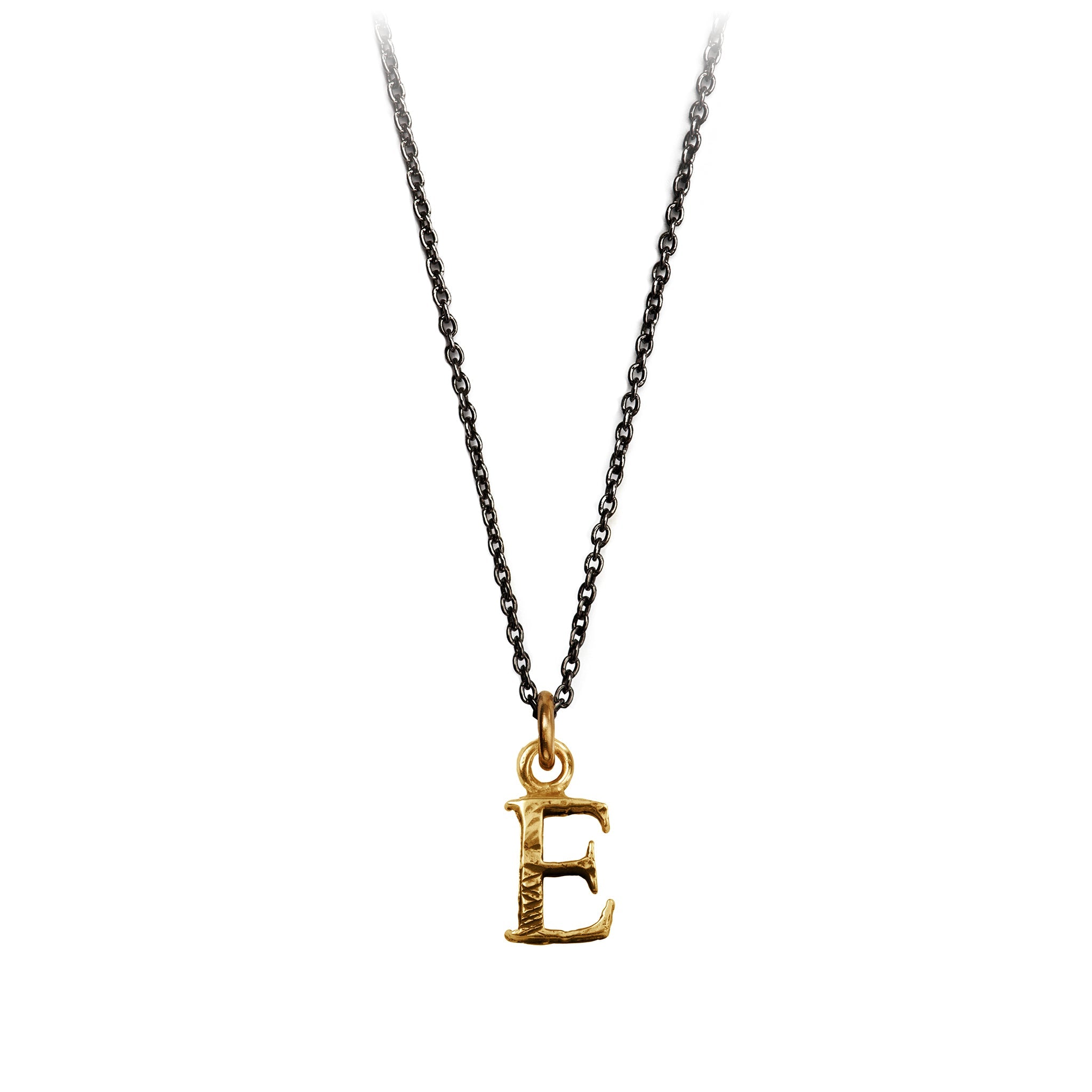 A bronze "E" charm on a blackened sterling silver chain