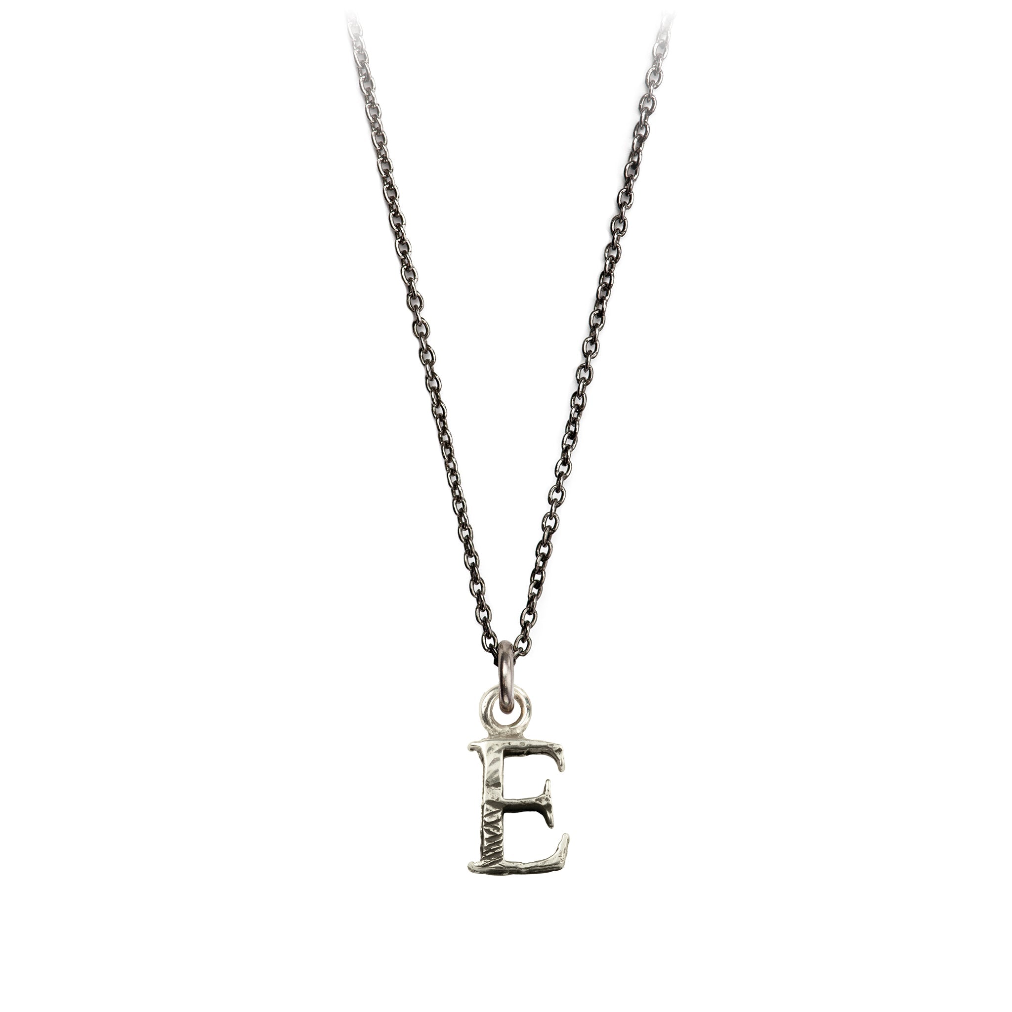 A sterling silver letter "E" charm on a silver chain.