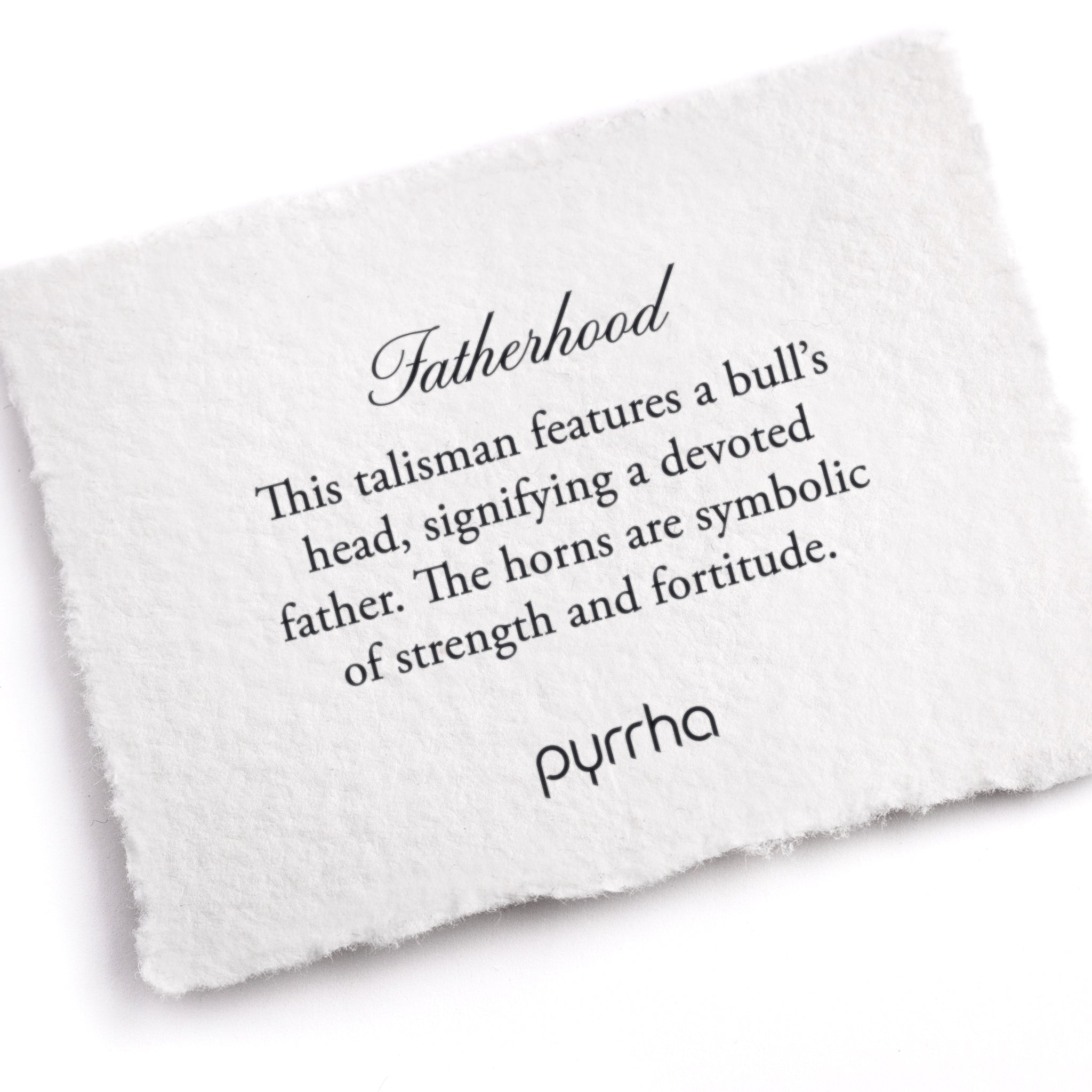 A hand-torn, letterpress printed card describing the meaning for Pyrrha's Fatherhood Talisman