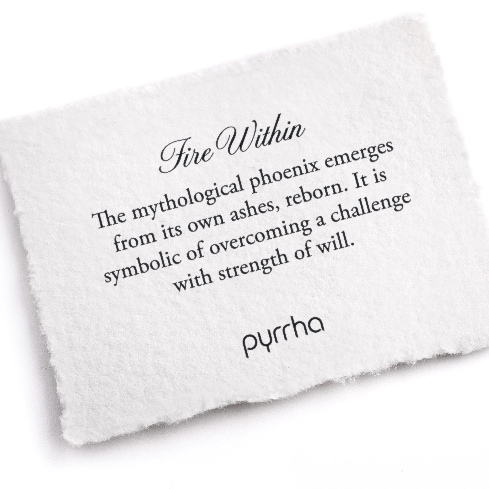 A hand-torn, letterpress printed card describing the meaning for Pyrrha's Fire Within Talisman