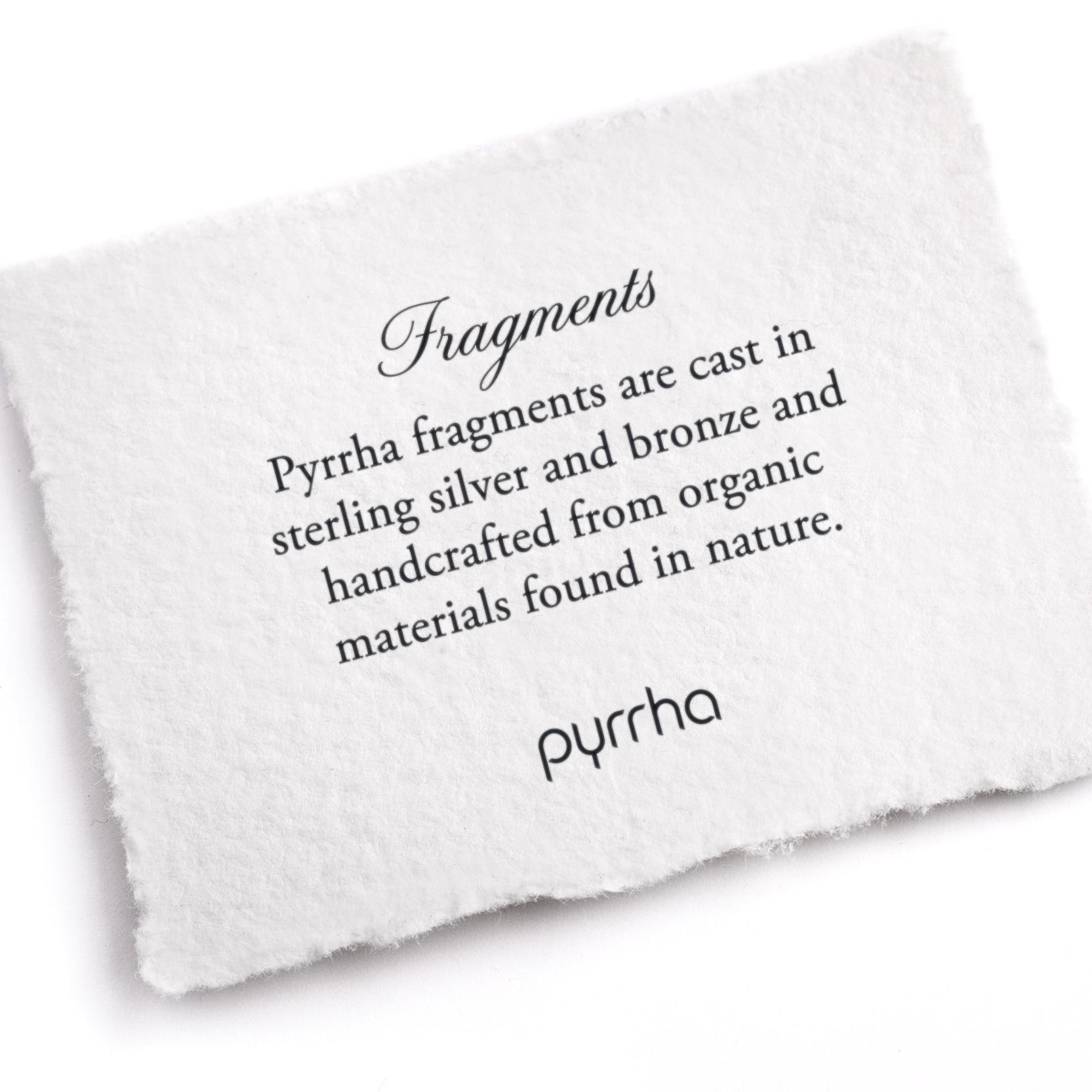 A hand-torn, letterpress printed card describing the meaning for Pyrrha's Fragments