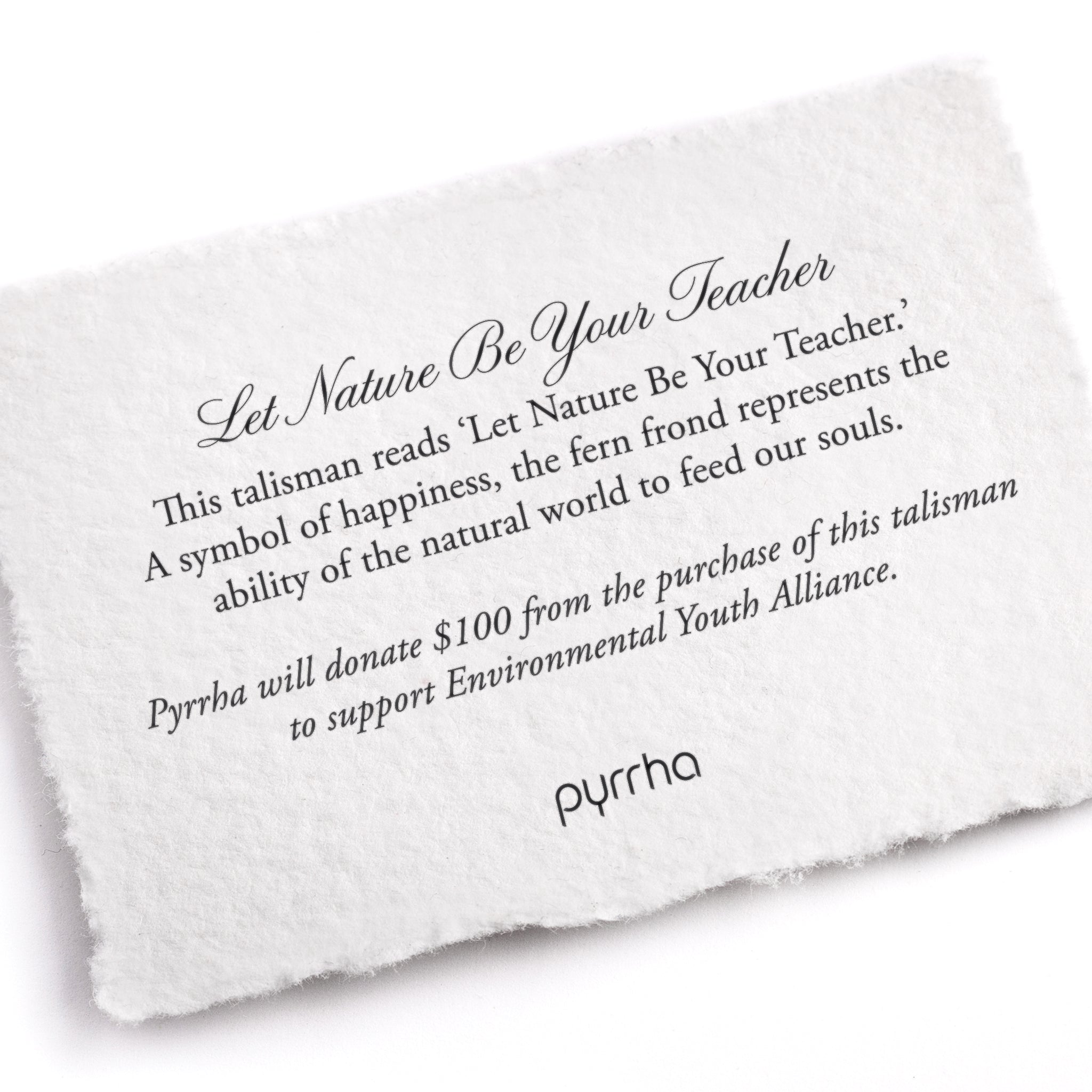 A hand-torn, letterpress printed card describing the meaning for Pyrrha's Let Nature Be Your Teacher Talisman