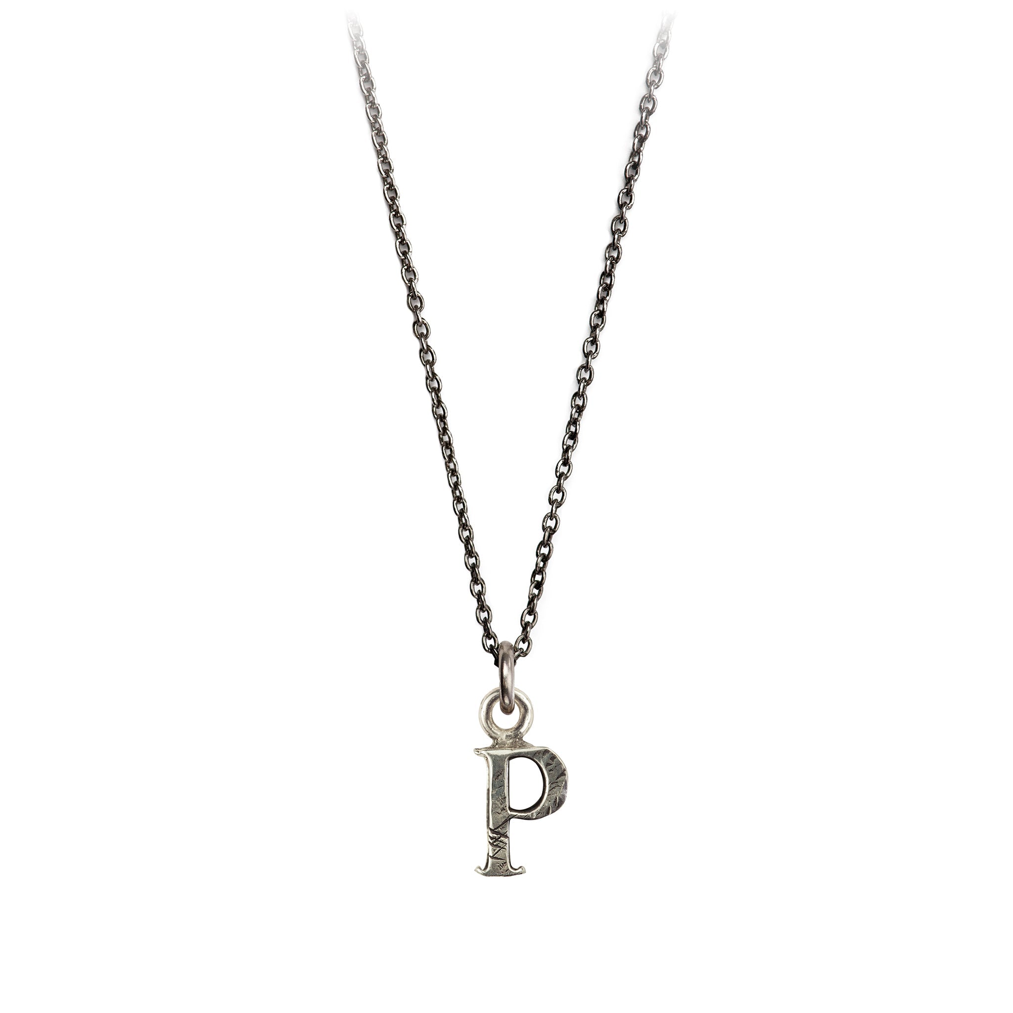 A sterling silver letter "P" charm on a silver chain.