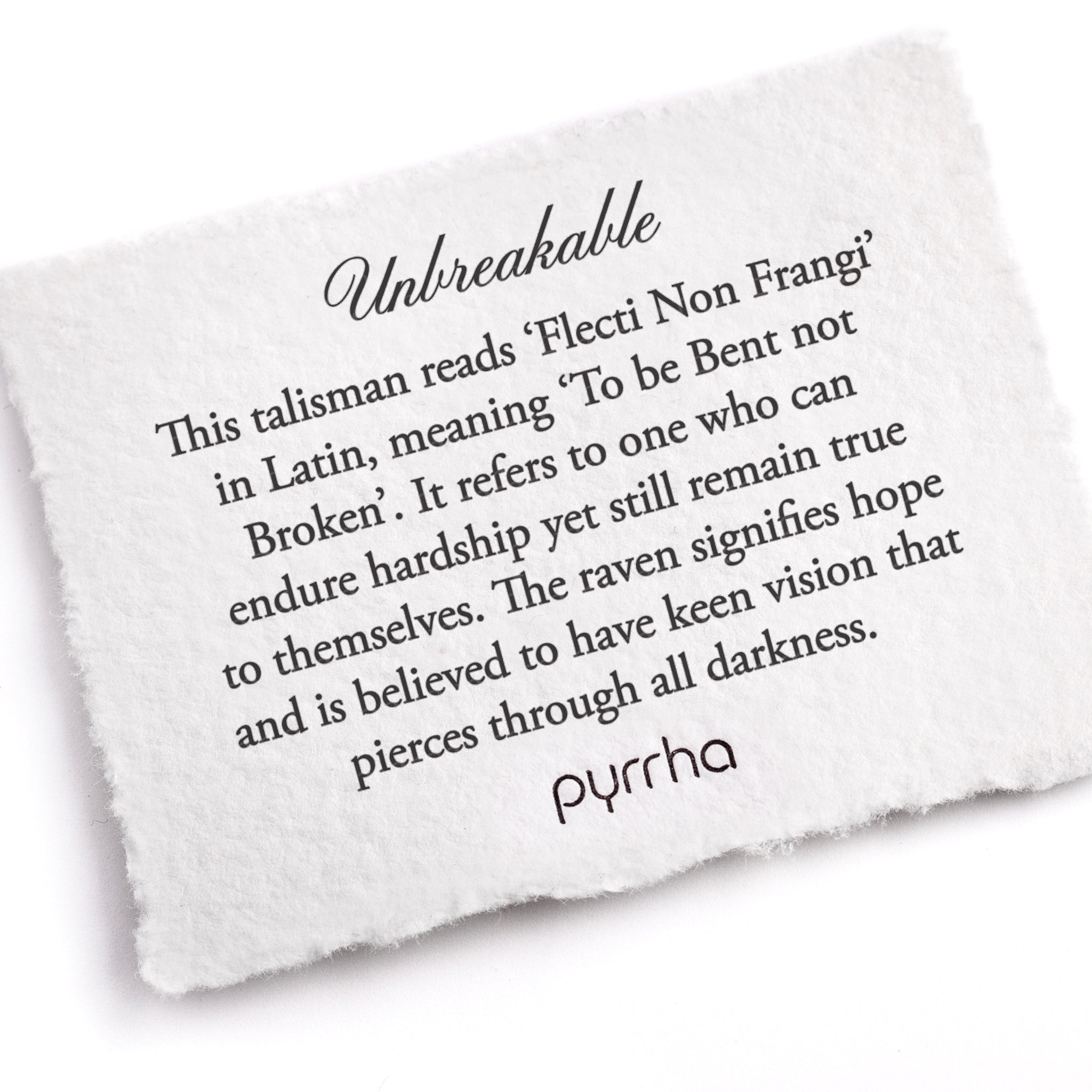 A hand-torn, letterpress printed card describing the meaning for Pyrrha's Unbreakable Talisman