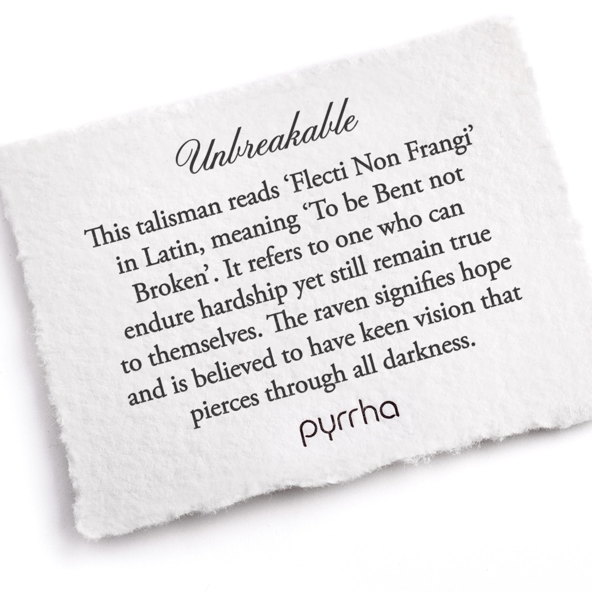 A hand-torn, letterpress printed card describing the meaning for Pyrrha's Unbreakable Talisman