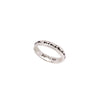 An silver band ring engraved with latin meaning while we live let us live